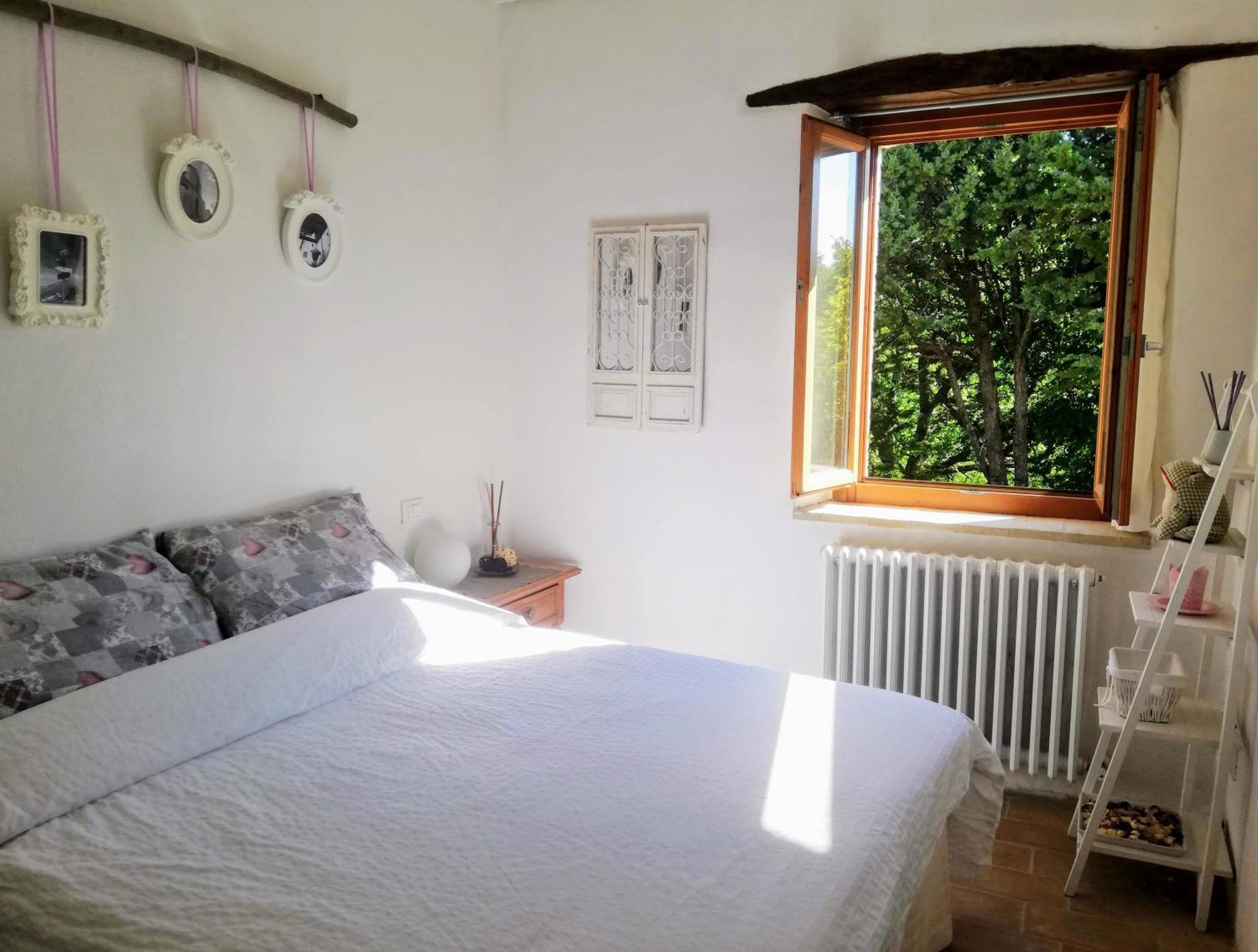 Bed and breakfast Le Ginestre Assise Chambre photo